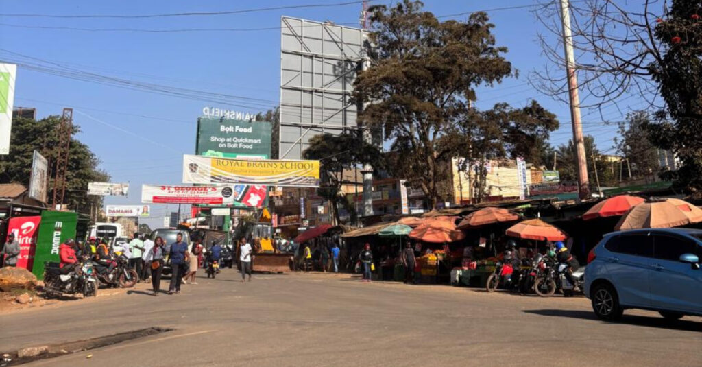 Daytime street view of the local commercial market and transit roads at Ruaka Center along Limuru Road.