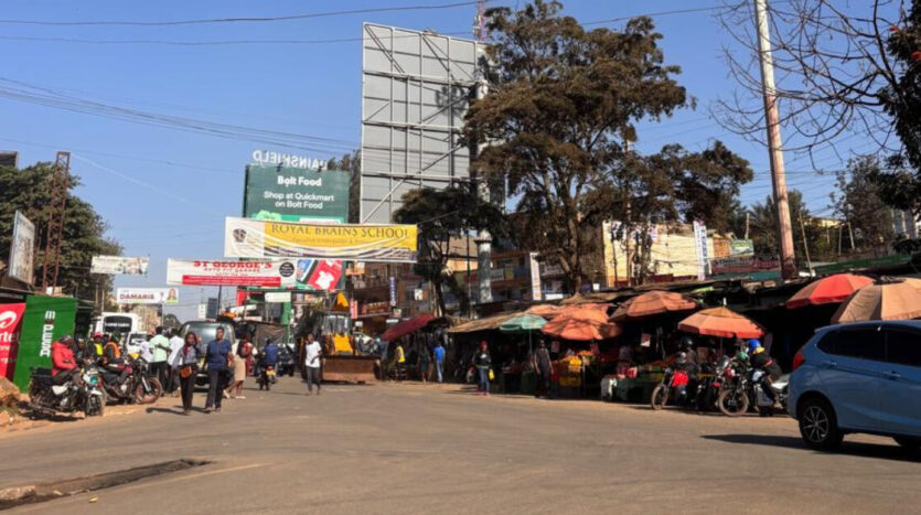 Daytime street view of the local commercial market and transit roads at Ruaka Center along Limuru Road.